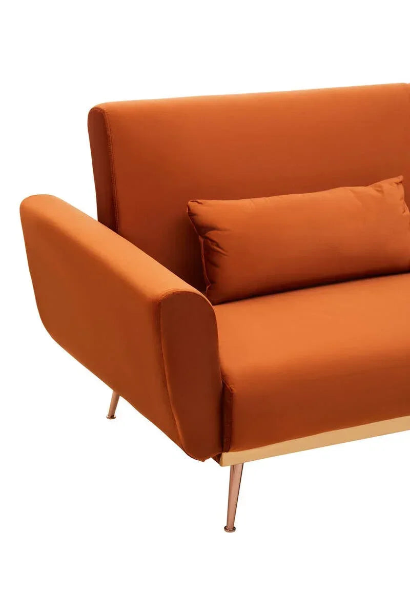 Orange fabric sofa with metal legs and matching lumbar cushion, close-up side view