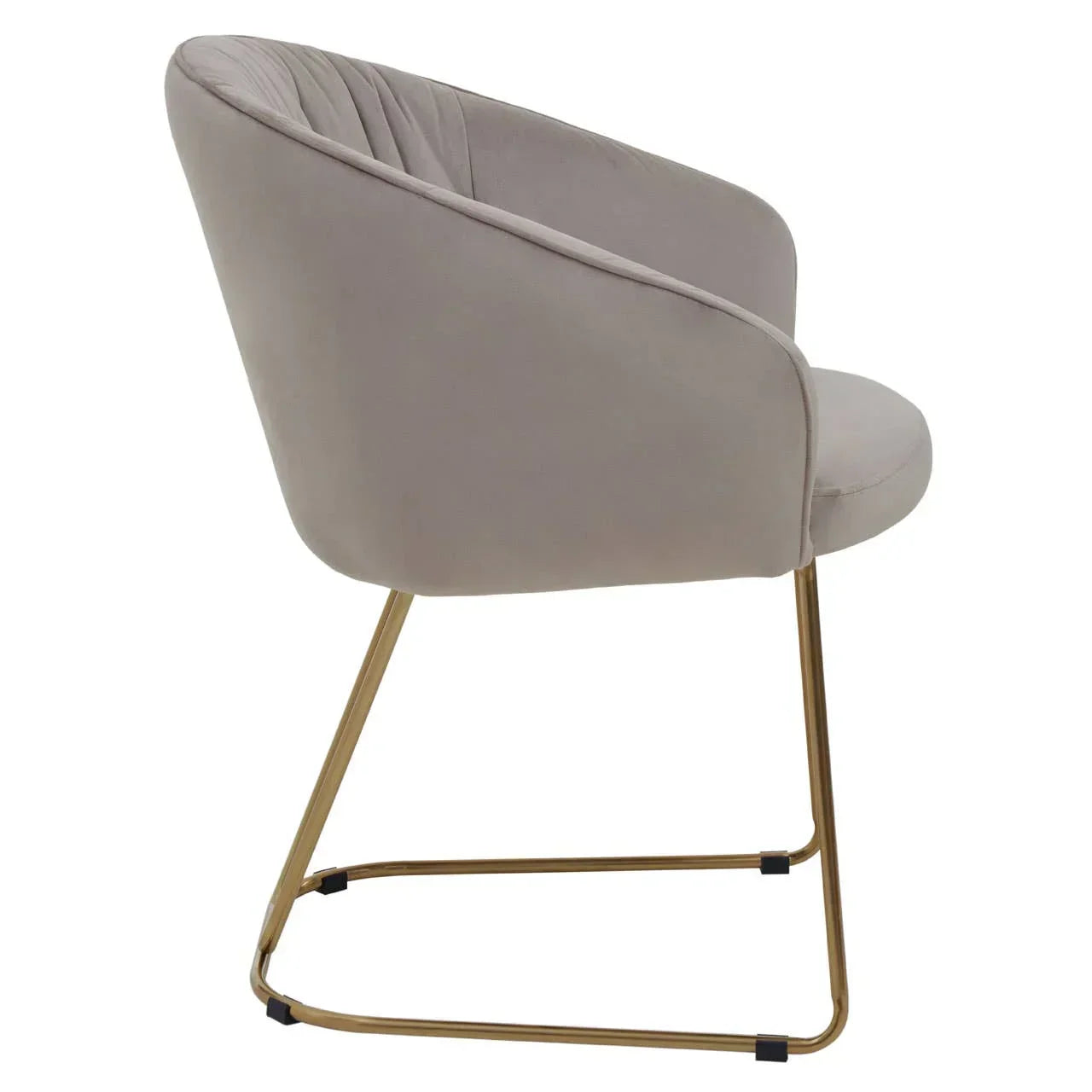 Beige accent chair with gold metal legs, side angle view showing curved back and armrests