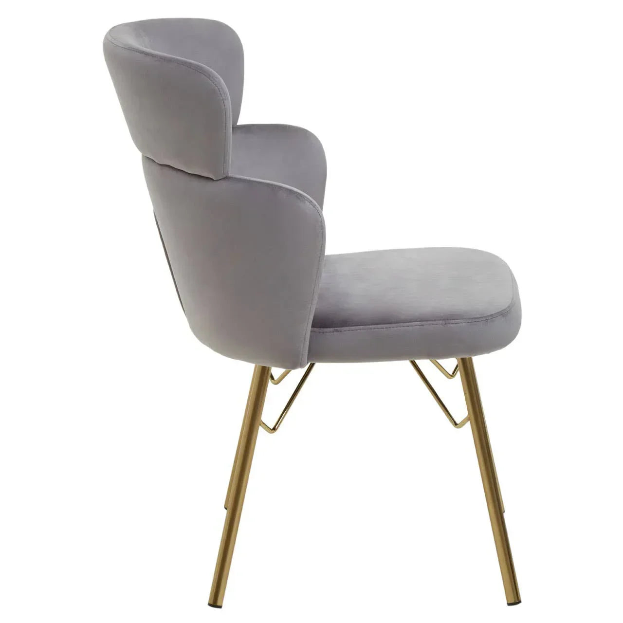 Grey velvet dining chair with gold metal legs, side view