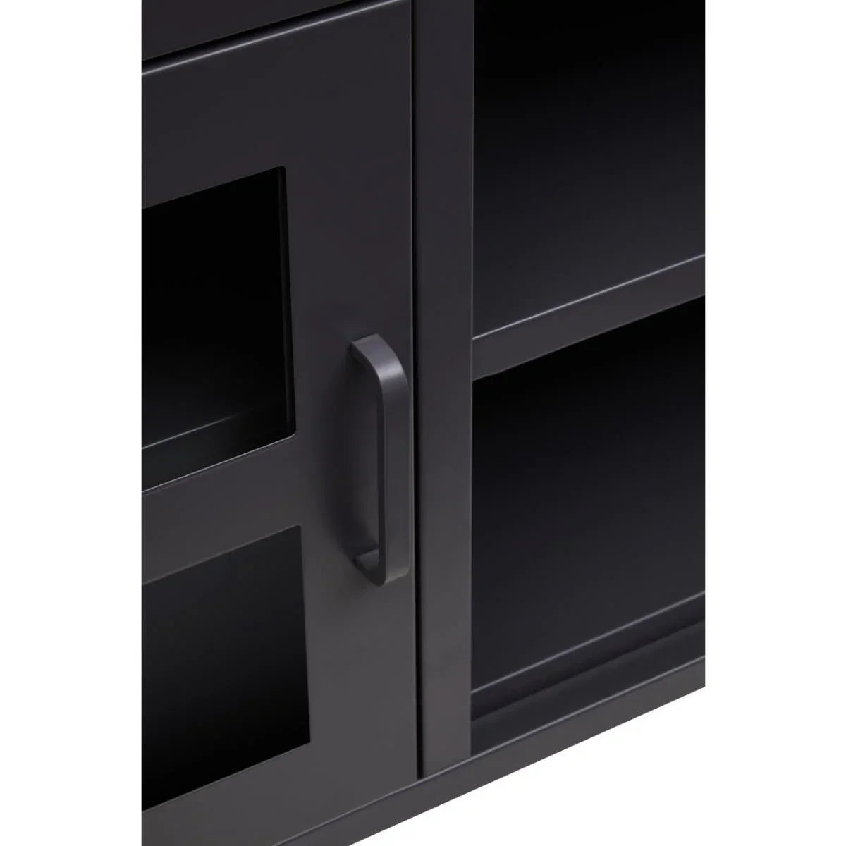 Black metal cabinet door with glass panel and handle, adjacent to open shelving