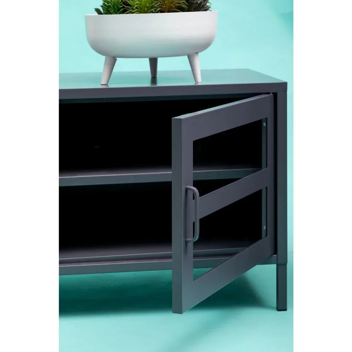 Grey metal sideboard cabinet with glass door open, shelf and planter on top