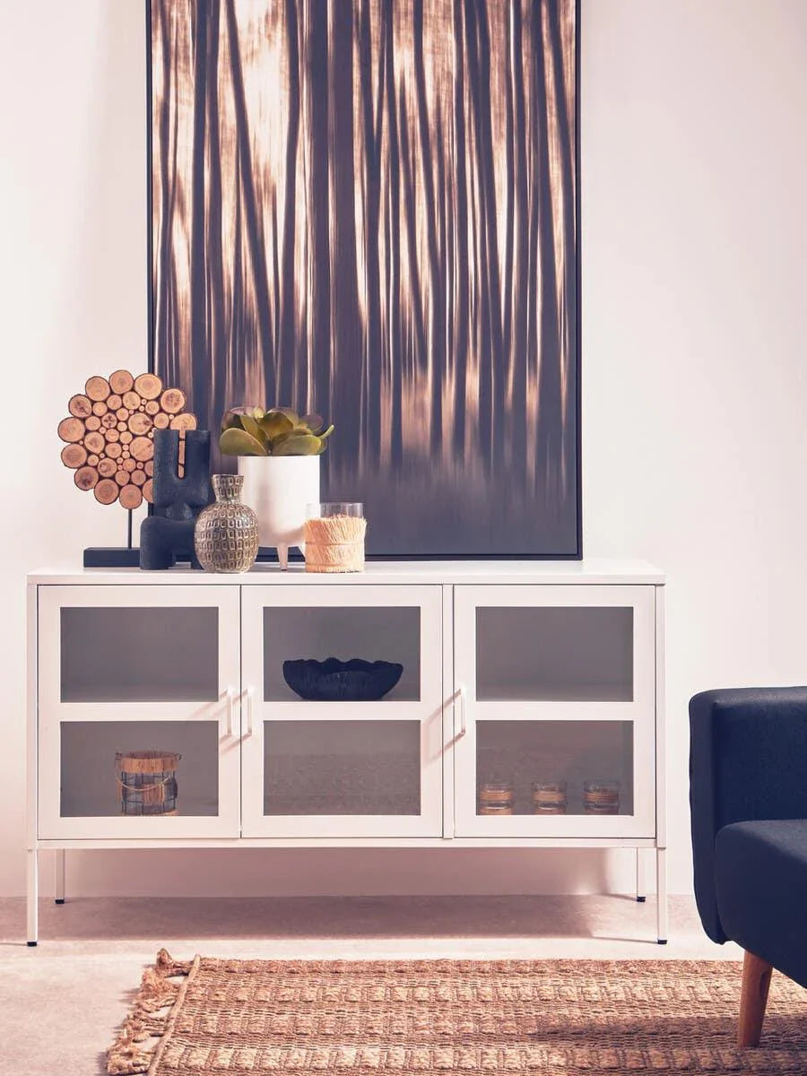 White glass door sideboard with decor accents in modern living room setting