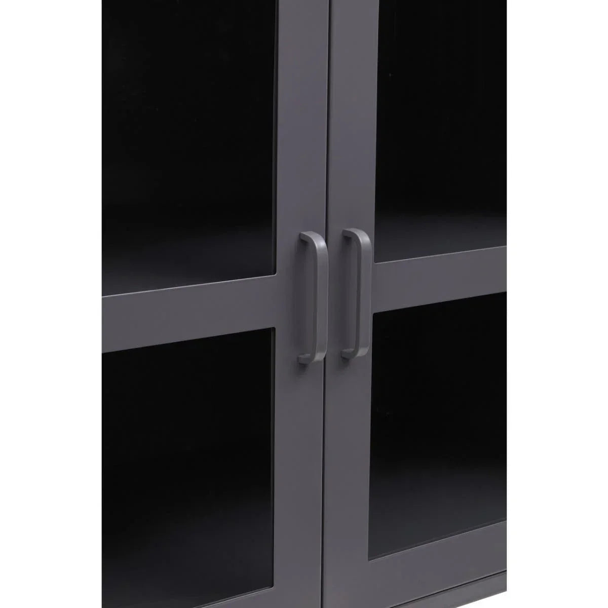 Closeup of grey cabinet doors with glass panels and metal handles