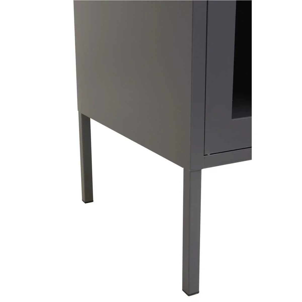 Closeup of grey metal cabinet legs and lower side panel