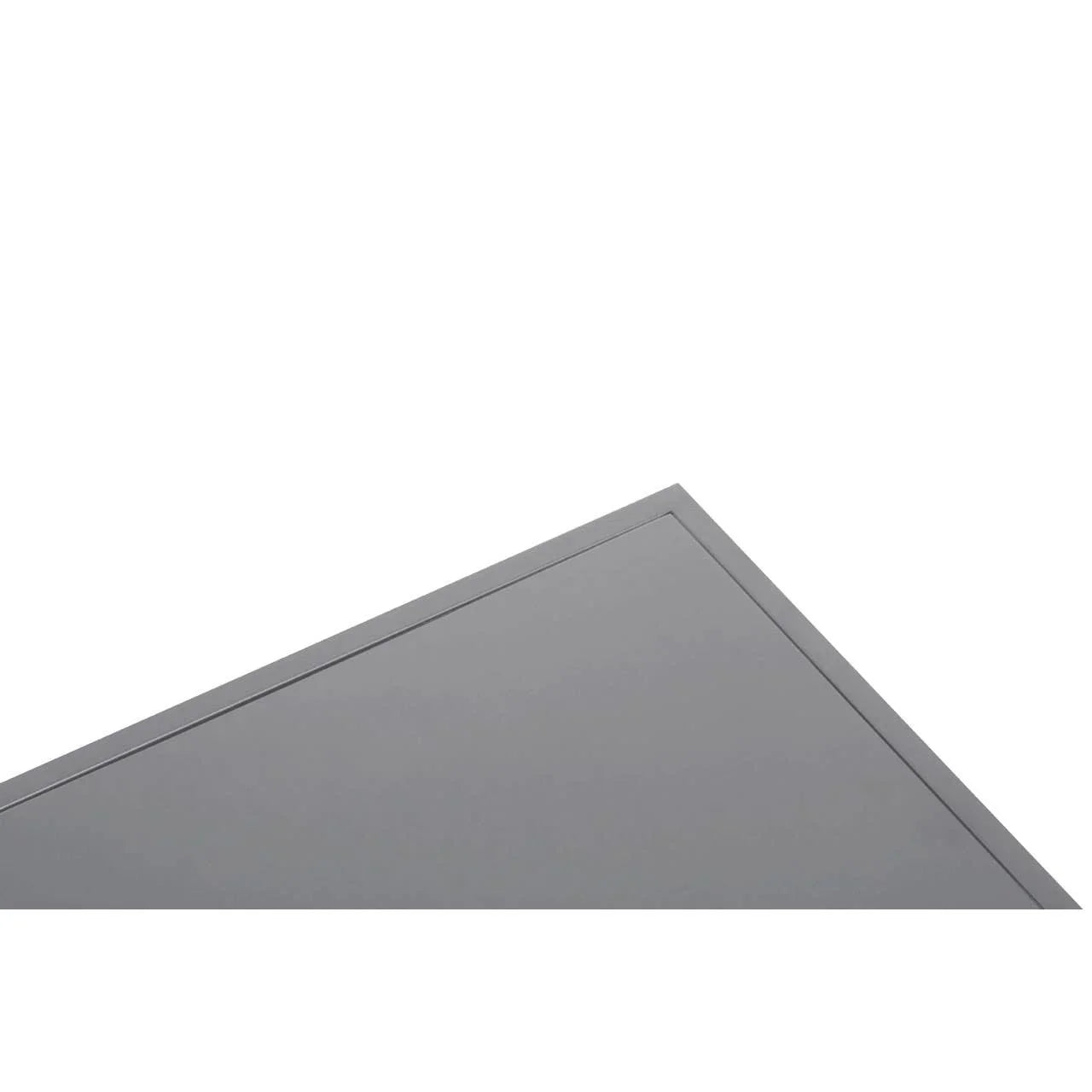 Corner detail of grey metal table top with smooth finish