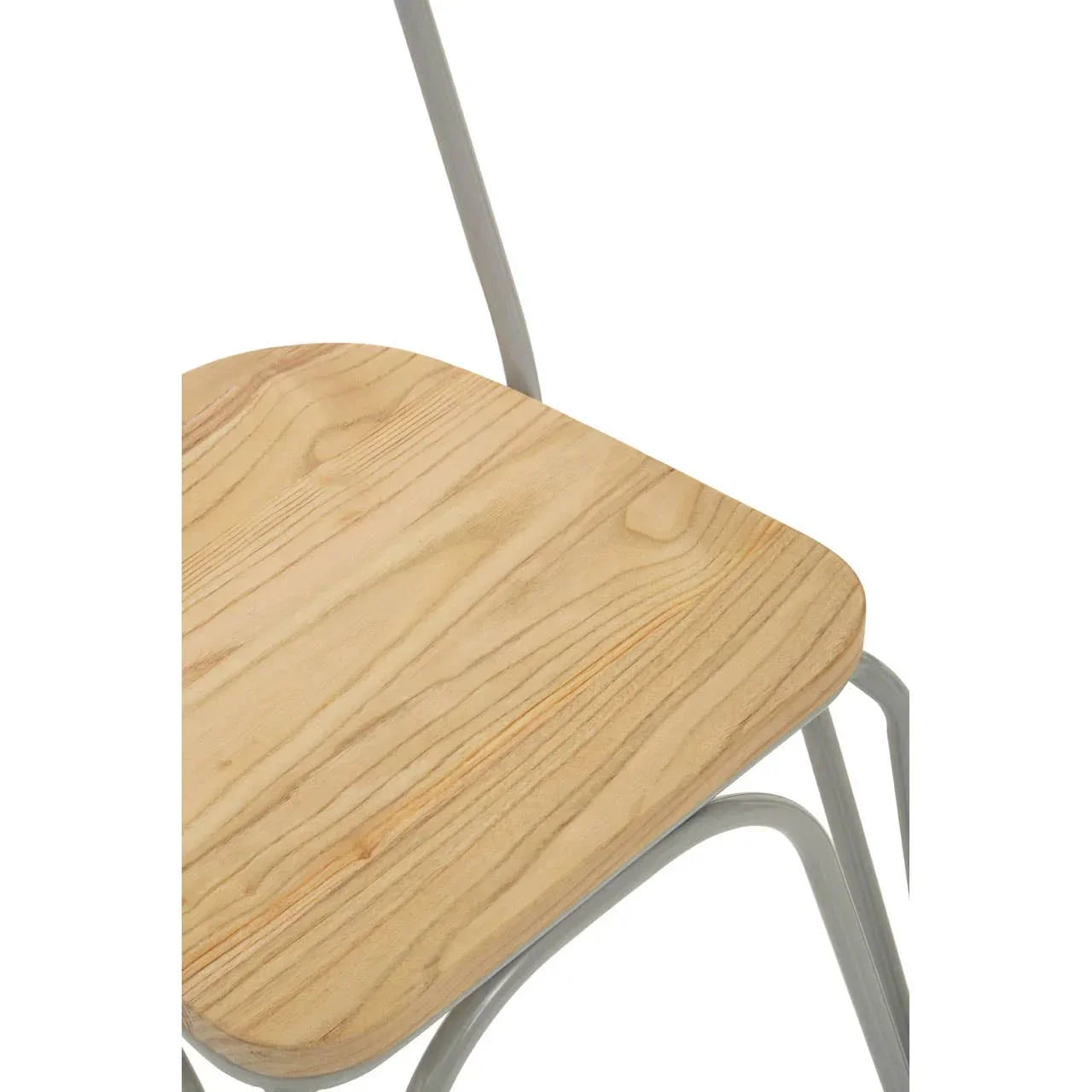 Close up of wooden dining chair seat with light metal frame