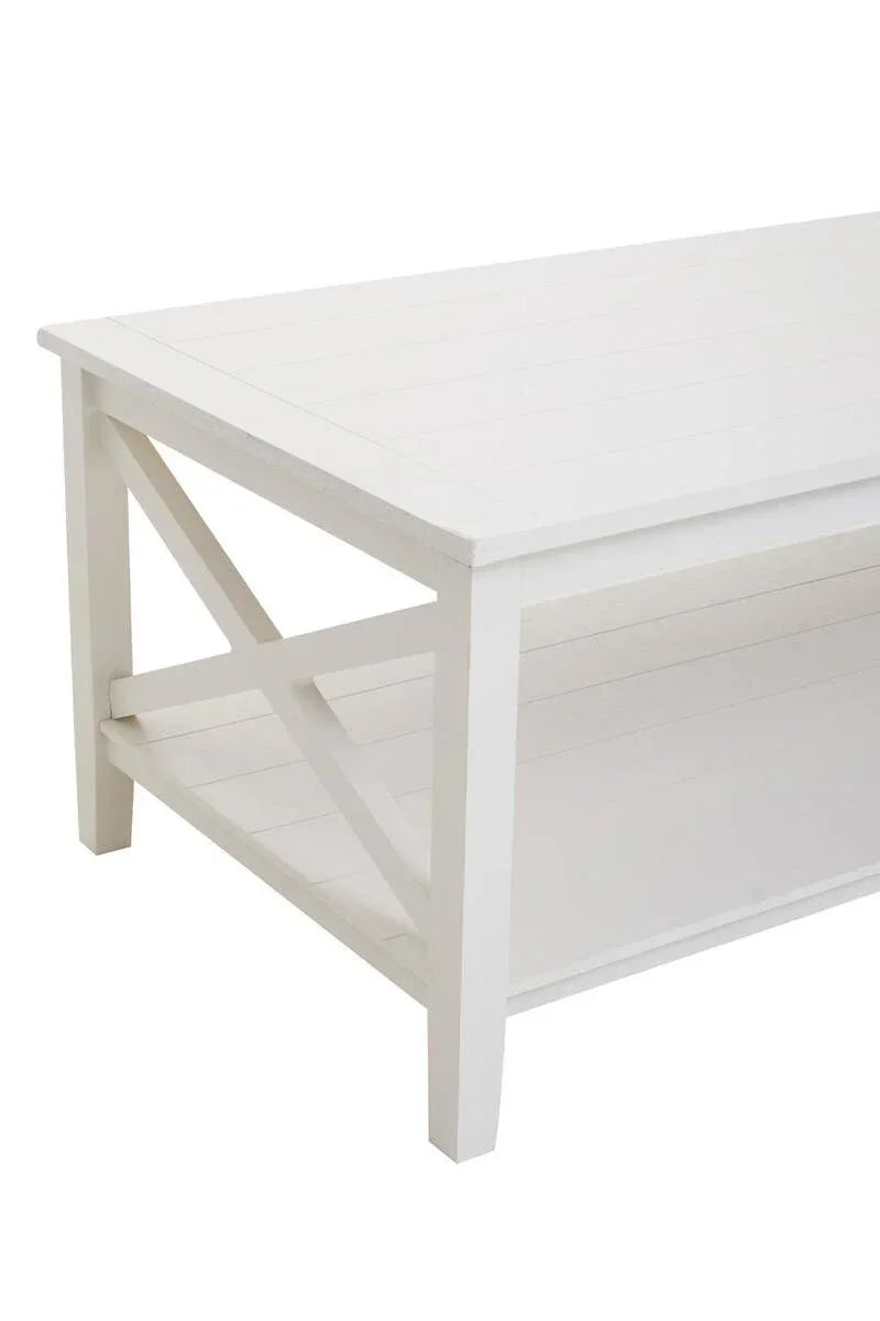 White wooden coffee table with lower shelf and cross side design