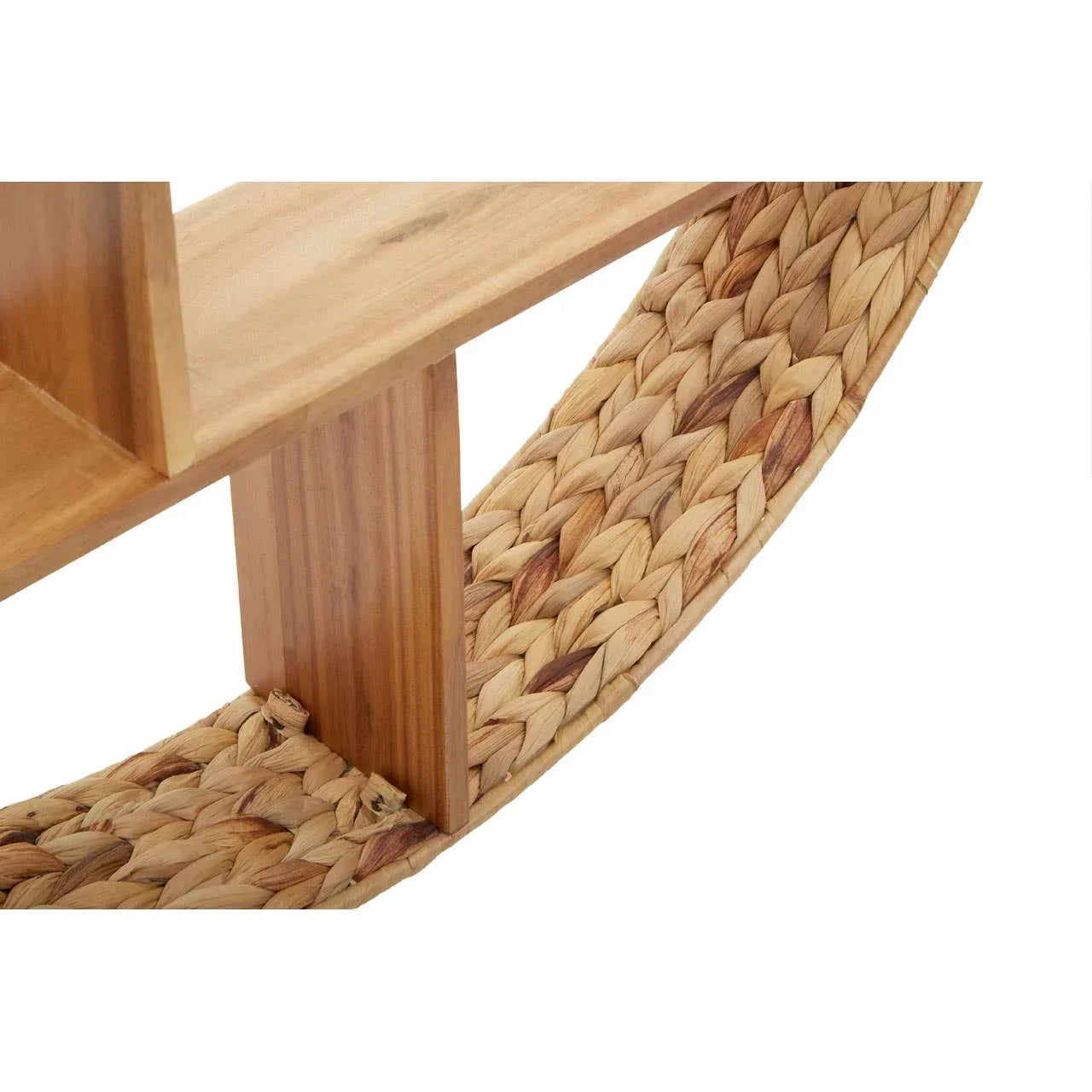 Close-up of wooden shelf with curved woven wicker base detail