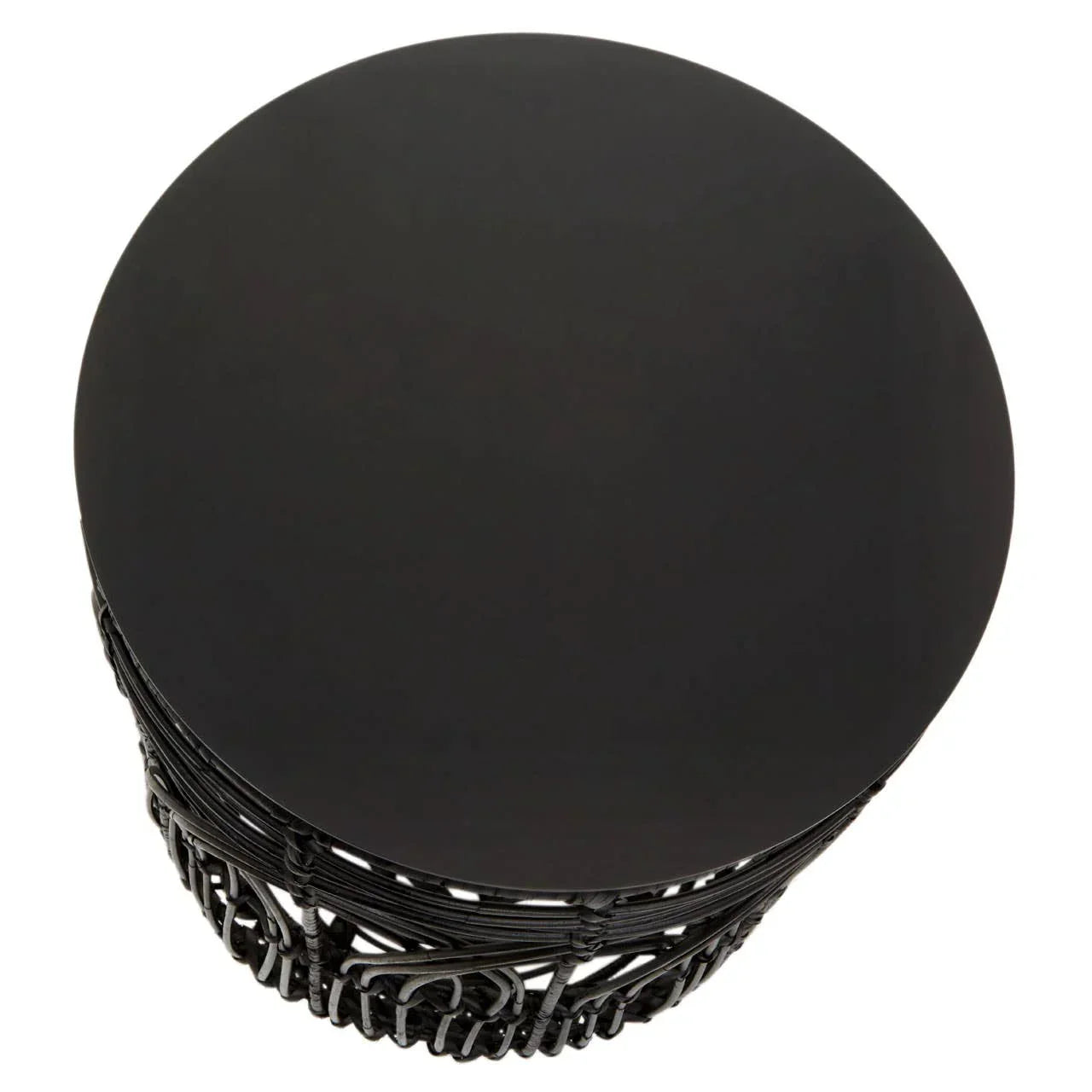 Round black side table with smooth top and woven metal base, overhead view