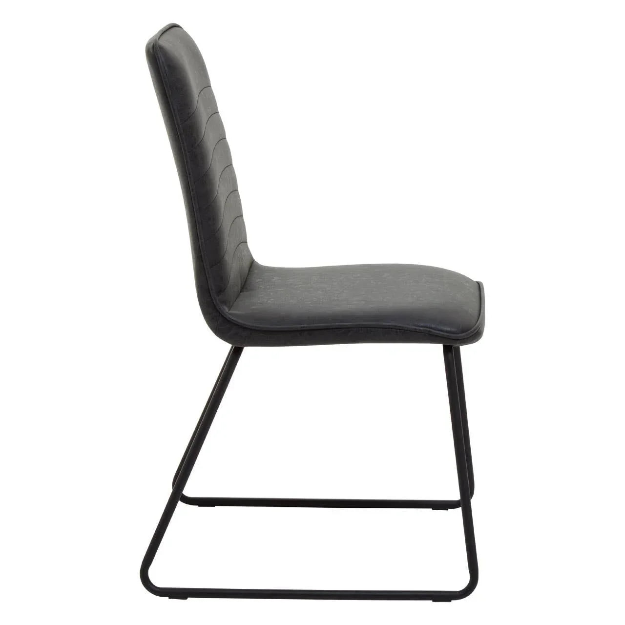 Black dining chair with metal sled base and curved padded seat, side profile view