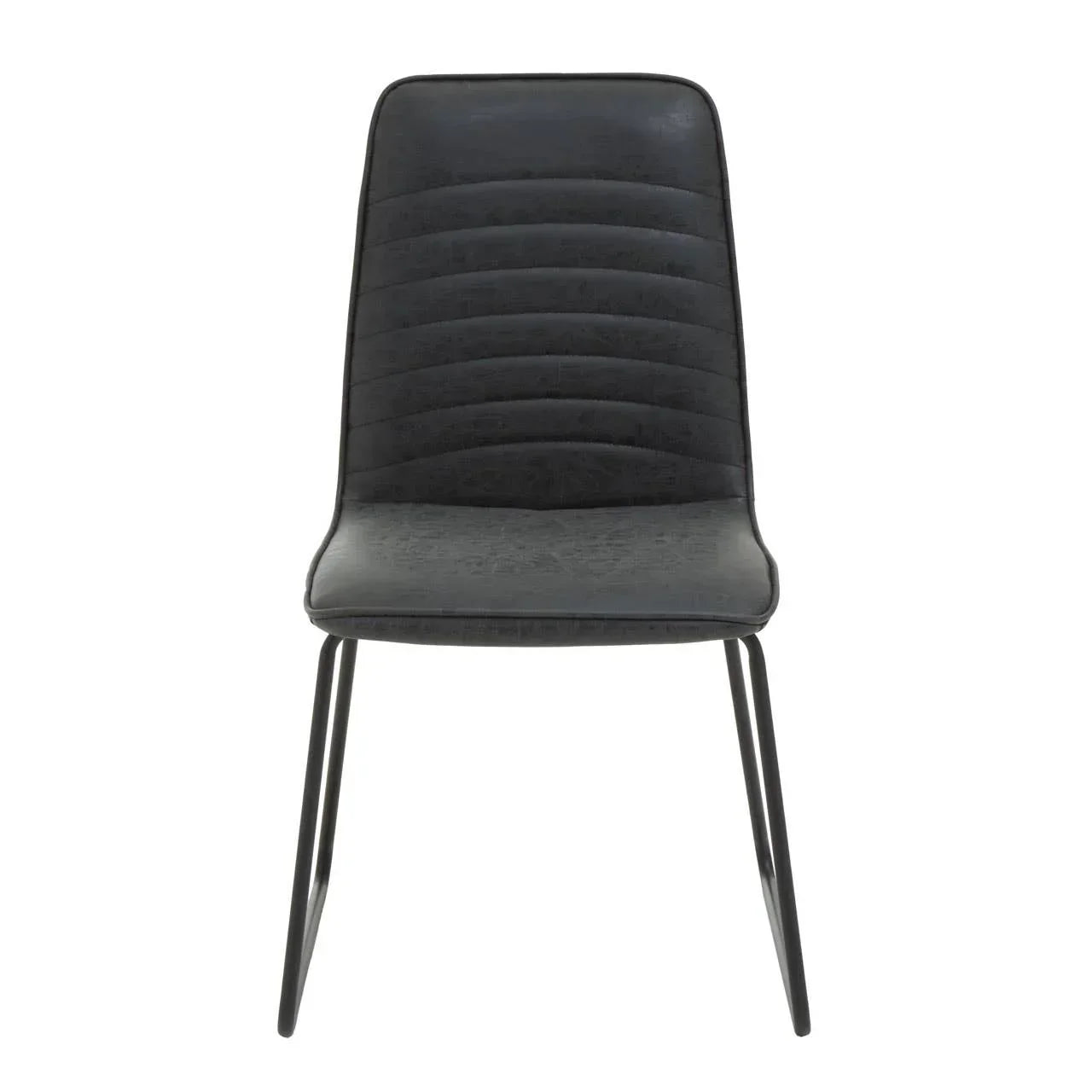 Black dining chair with curved seat, stitched lines, and slim black metal legs, front view