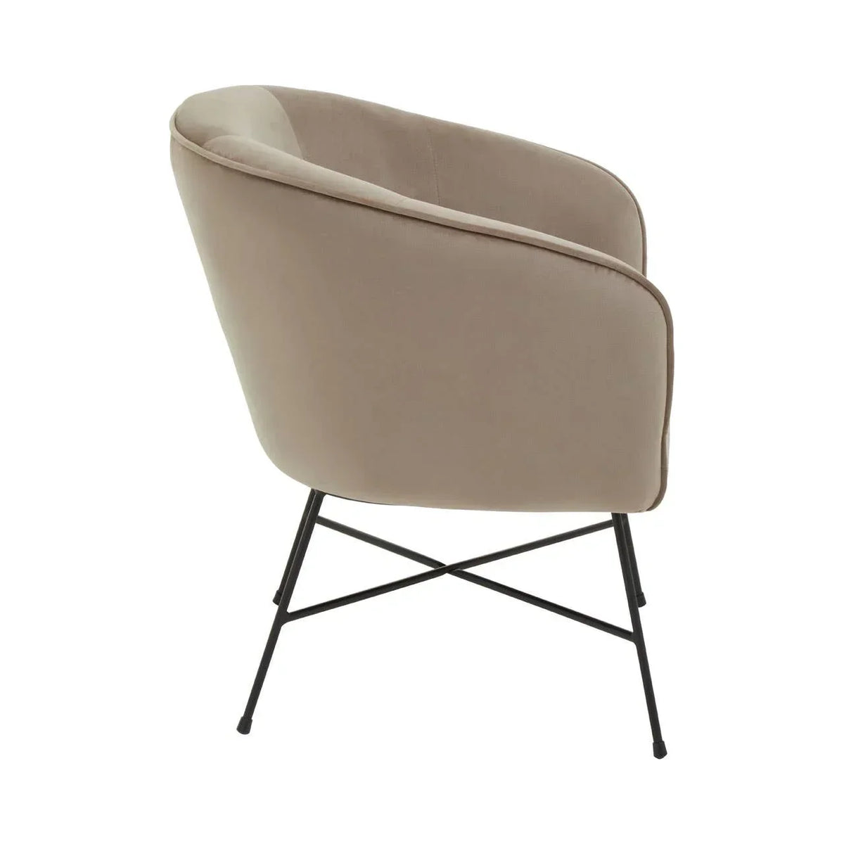 Beige velvet accent chair with curved back and black metal legs side angle view