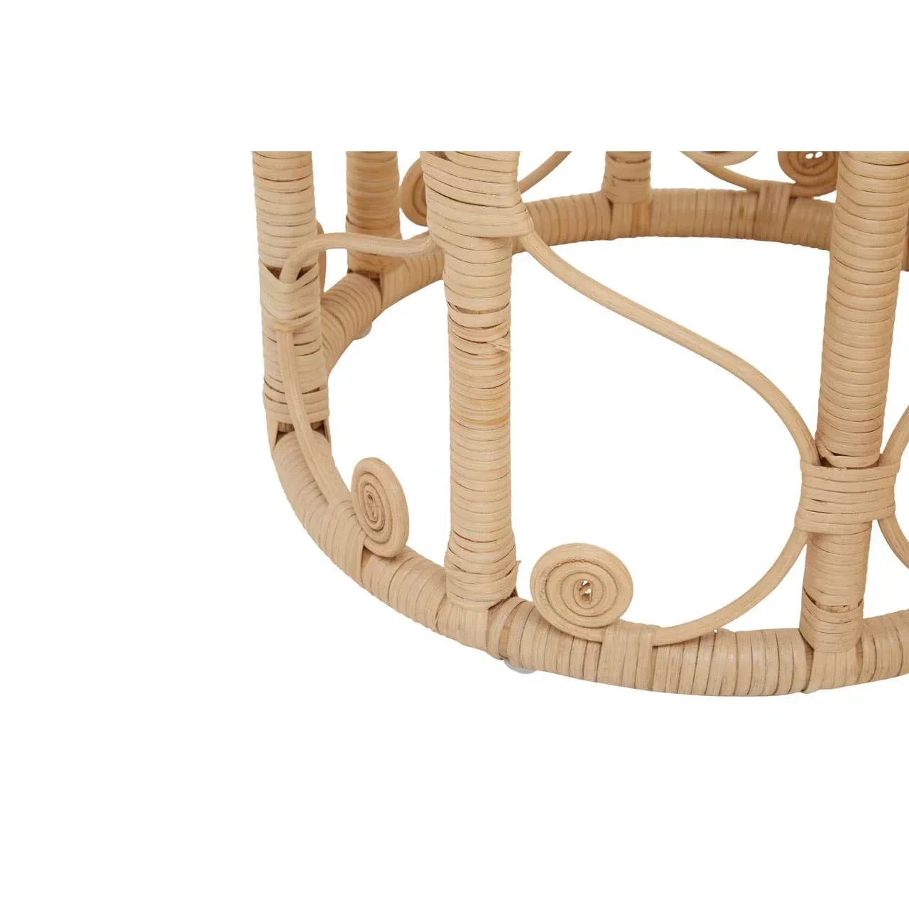 Close detail of round rattan table base with natural wicker and spiral accents