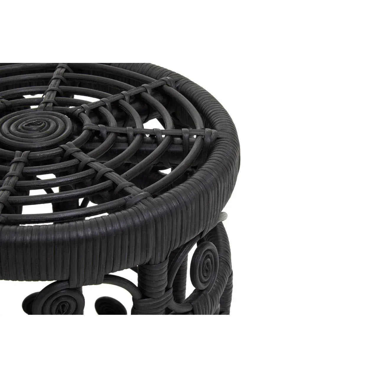 Black rattan stool with round woven top and spiral pattern detail, close-up view