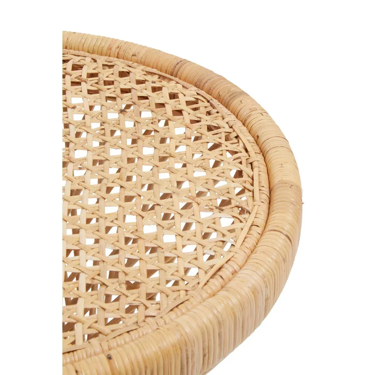 Closeup of natural rattan table top with woven cane detail and round edge