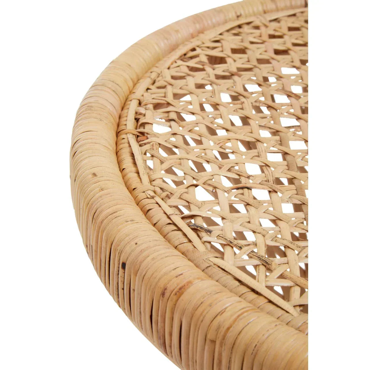 Close up of natural rattan table top showing woven cane detail and rounded edge
