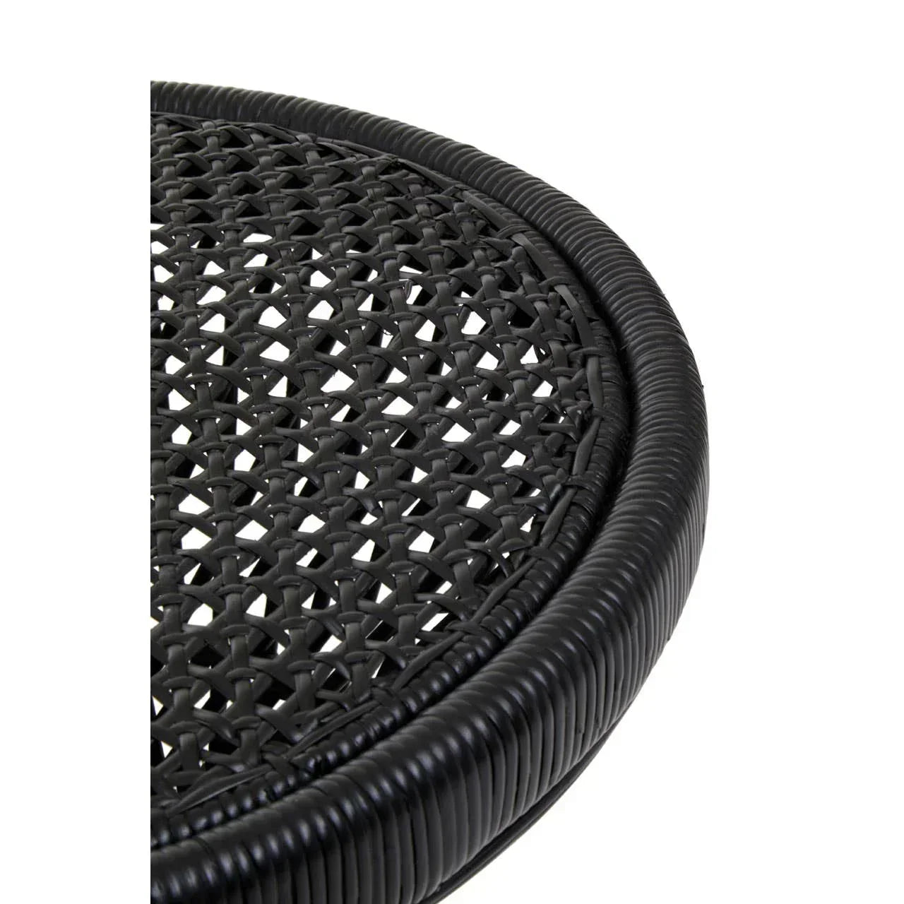 Close-up of black rattan table top with woven outdoor furniture detail