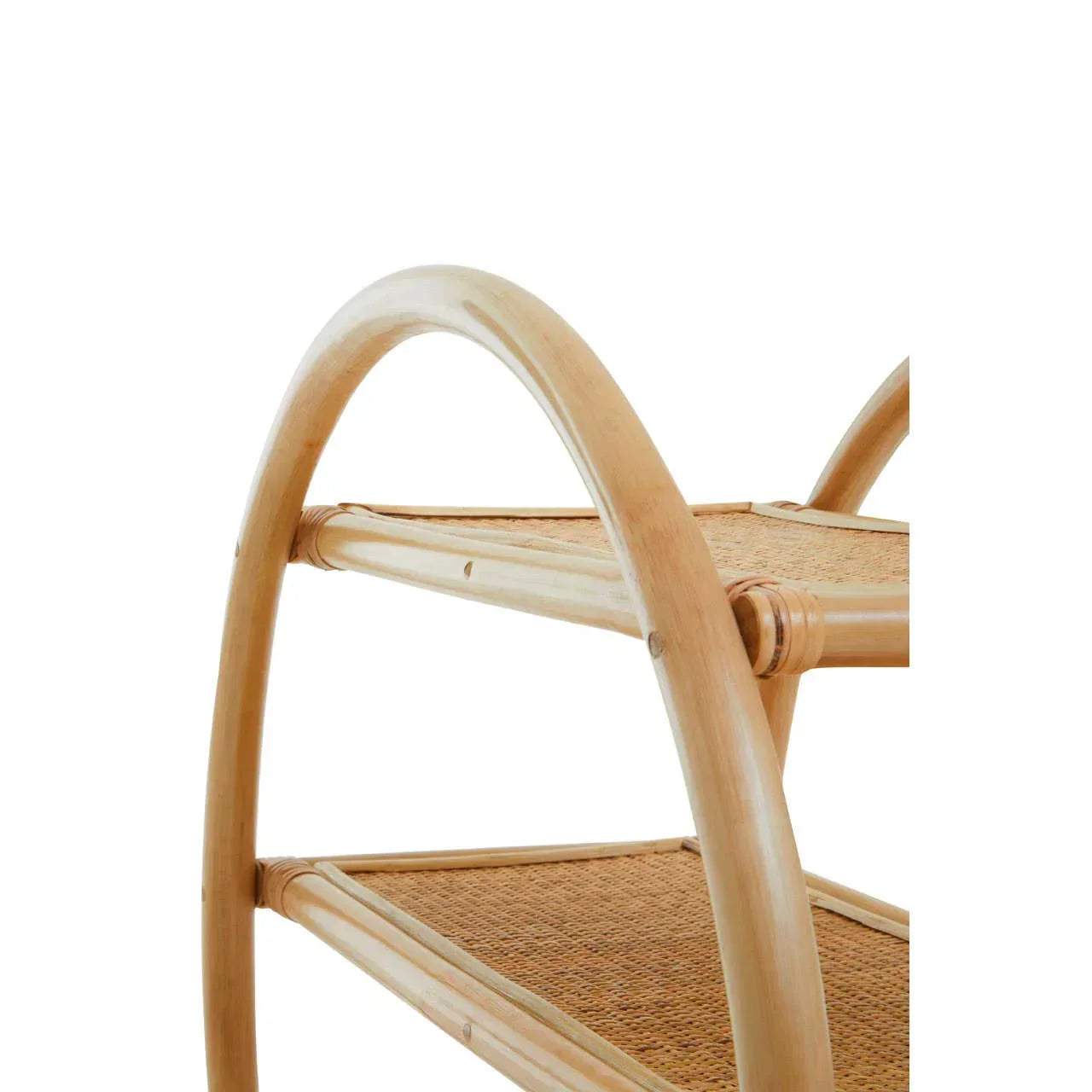 Closeup of rattan side table with natural wood frame and woven shelves