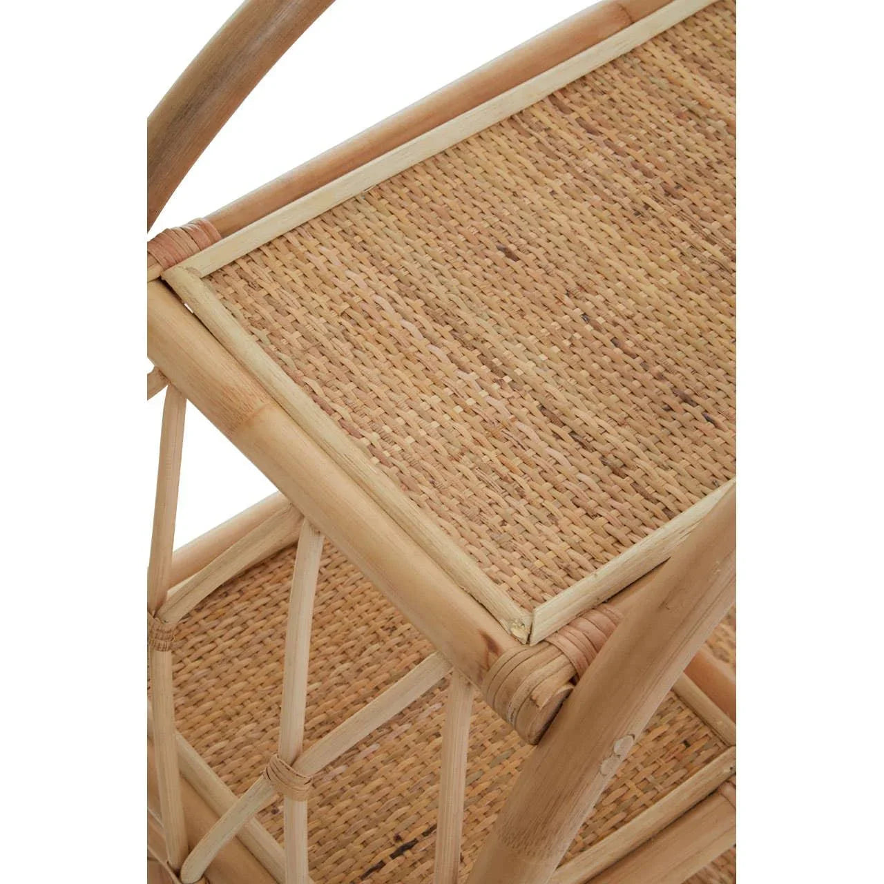Close detail of natural rattan furniture shelf with woven cane surface and bamboo frame