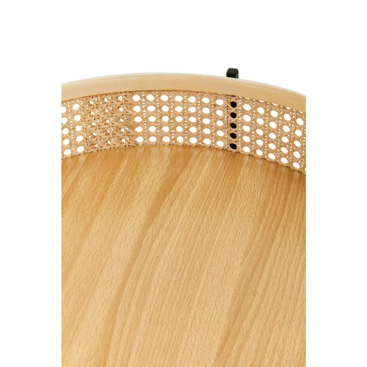 Closeup of rattan backrest and light wood seat on dining chair