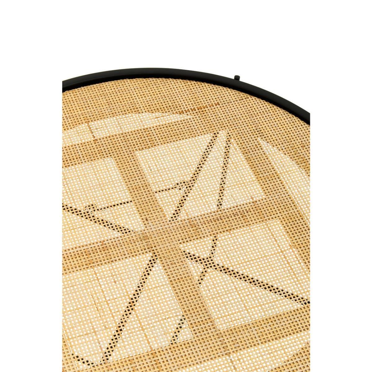 Closeup of woven rattan furniture tabletop with black metal edge detail
