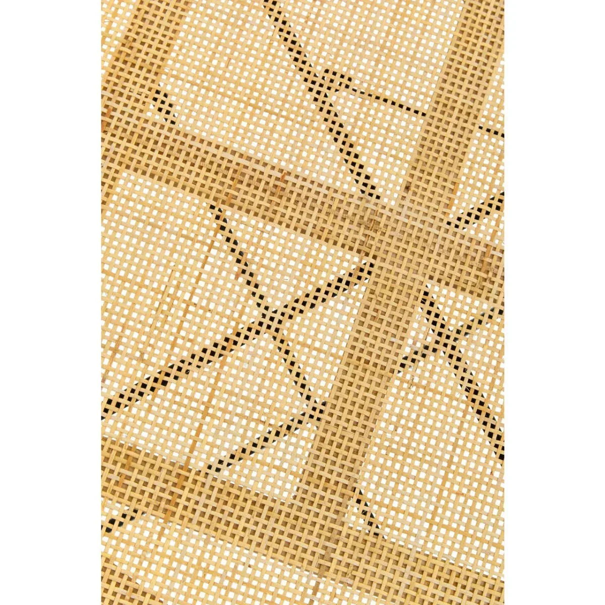 Close-up of natural rattan furniture weave detail showing interlaced cane pattern