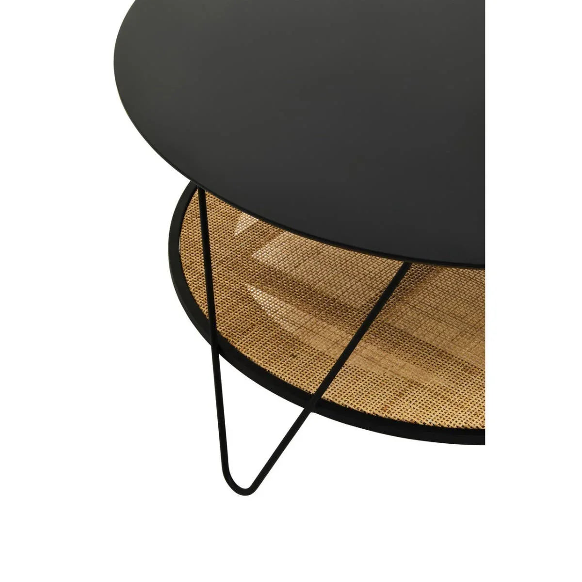 Round black coffee table with cane shelf and metal hairpin legs, close detail view