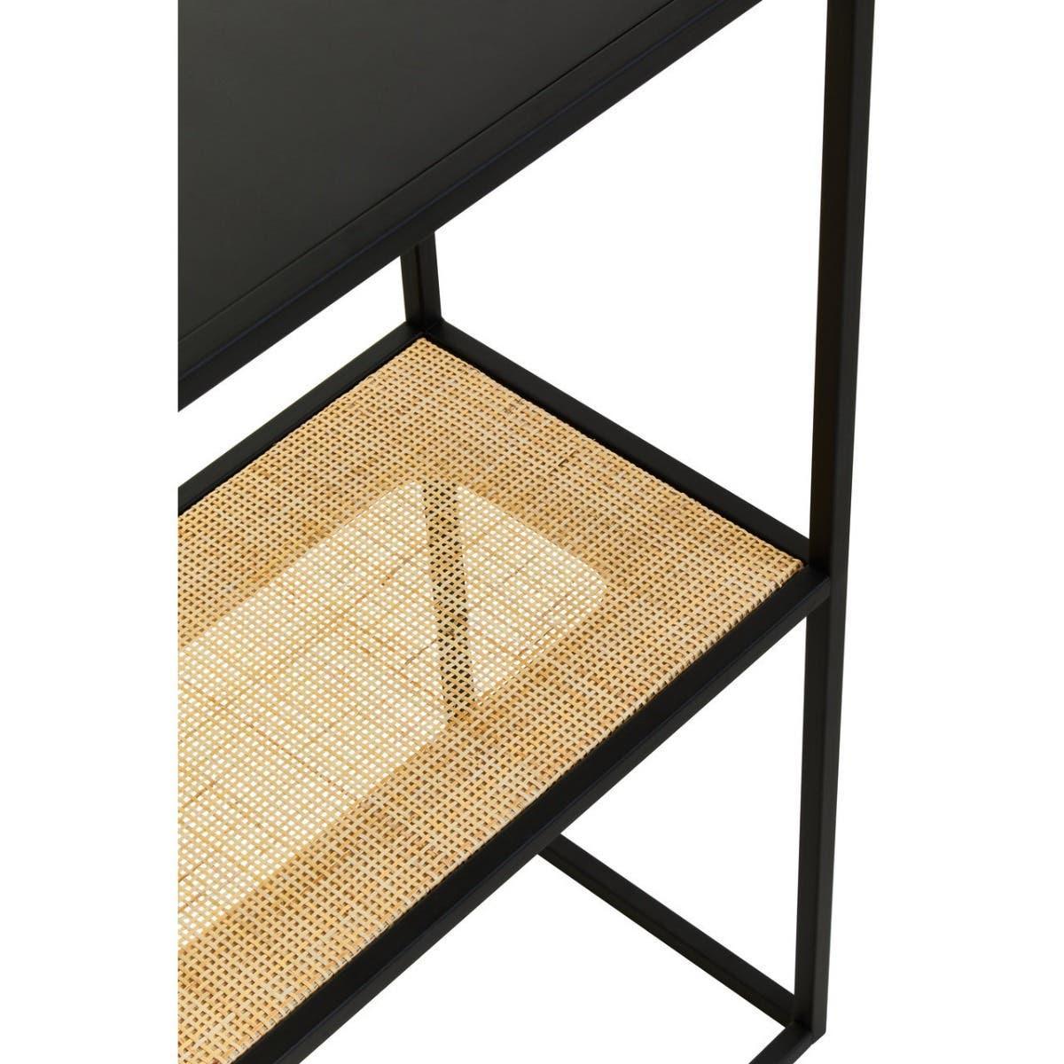 Black metal side table with woven cane lower shelf detail