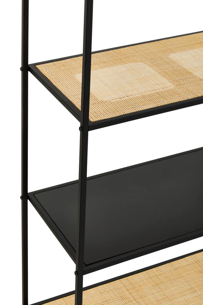 Black metal shelving unit with natural rattan shelves and minimalist design, side angle view