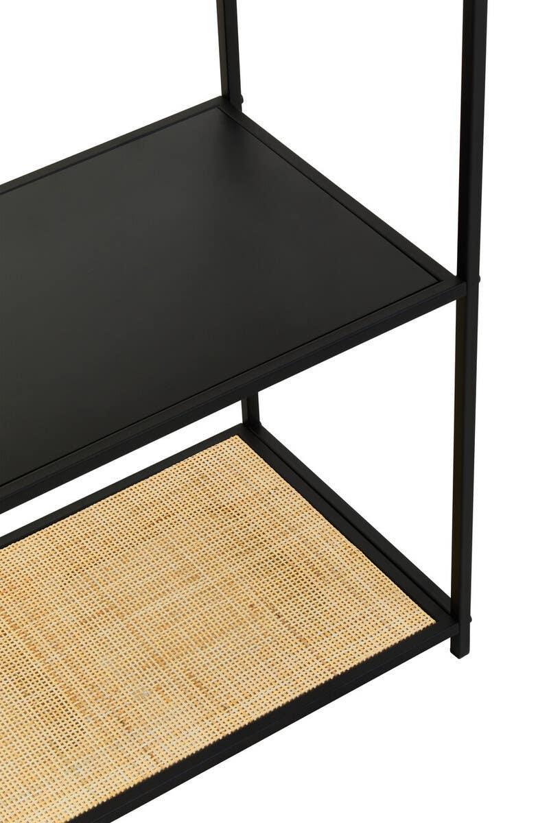 Black metal shelving unit with woven rattan lower shelf and matte black upper shelf