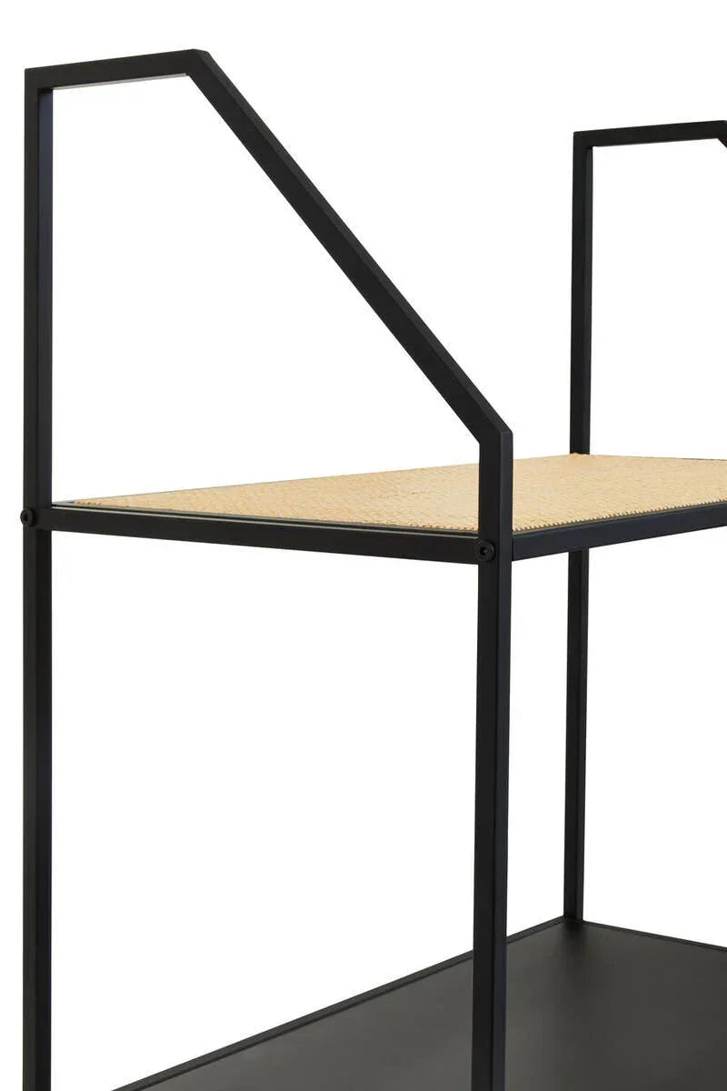 Black metal shelving unit with rattan middle shelf and minimalist frame, side angle view