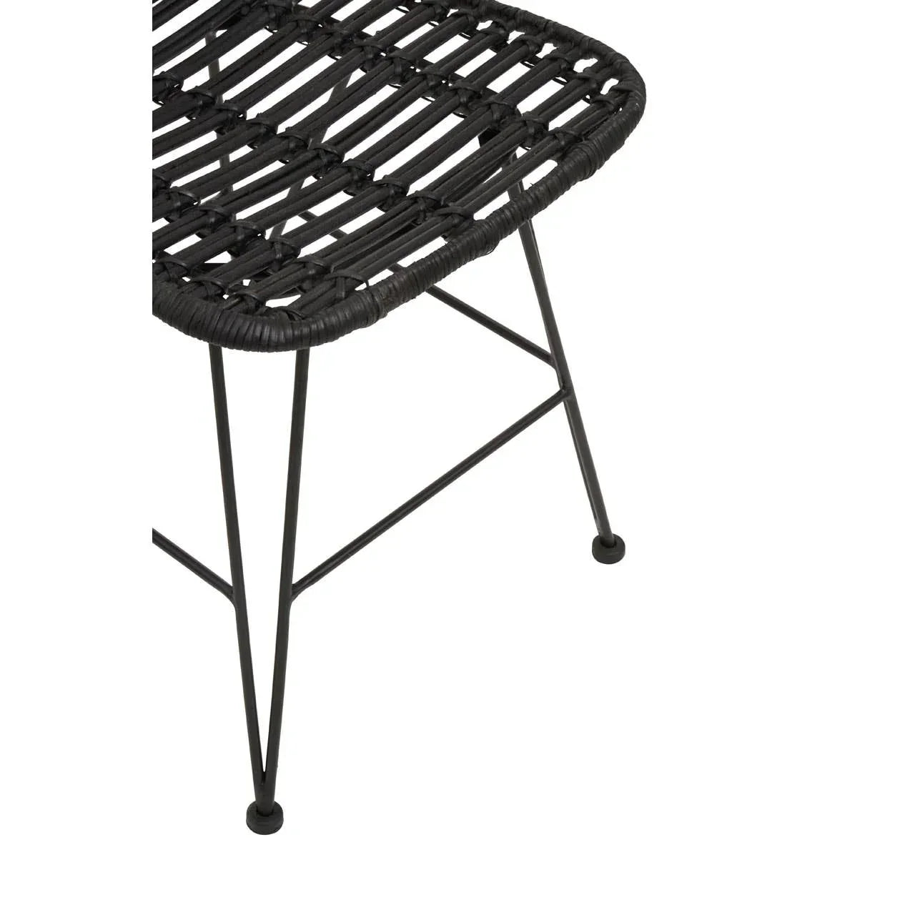 Close up of black rattan chair seat with metal frame and angled legs