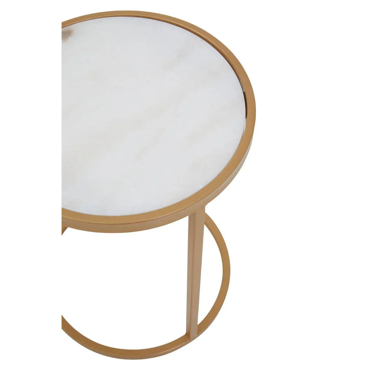 Round side table with white marble top and gold metal frame, angled overhead view