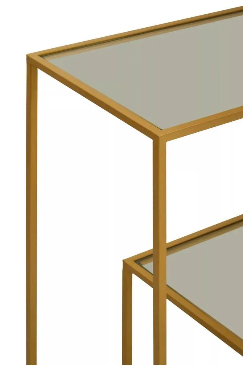 Gold metal frame console table with clear glass top and shelf, close corner view