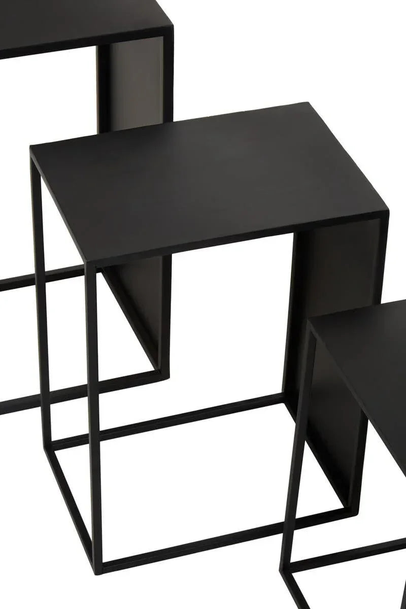 Set of black metal nesting tables with open geometric frames, shown from above