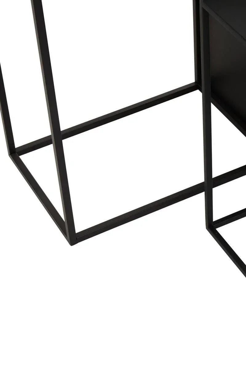 Black metal legs and frame of modern nesting tables on white background
