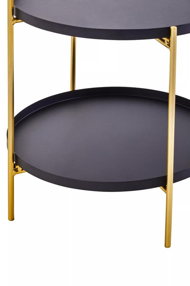 Two-tier side table featuring a sleek black circular top and bottom shelf, supported by elegant gold metal legs. The design is modern and minimalist, suitable for various home decor styles