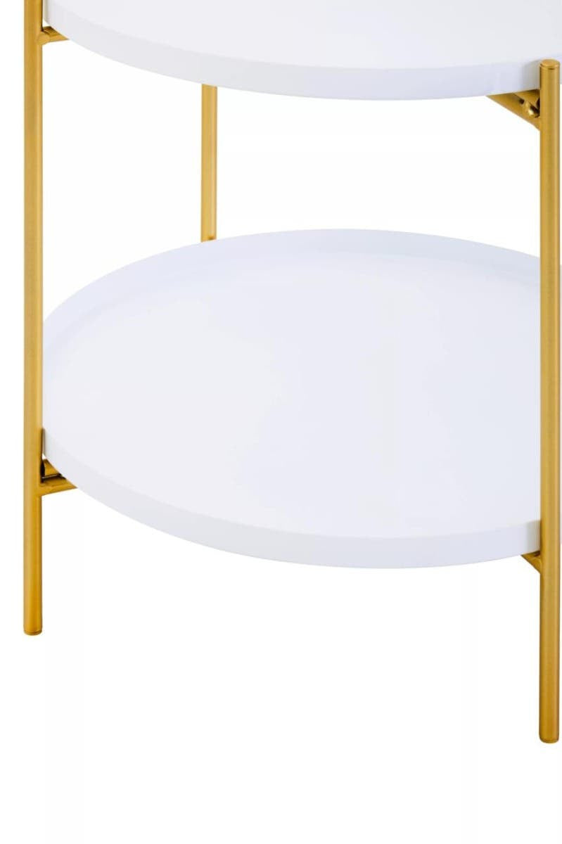 A two-tier side table featuring a sleek white surface and elegant gold metal legs, showcasing a modern design suitable for home decor. The table has a round top and a lower shelf, both with a smooth finish