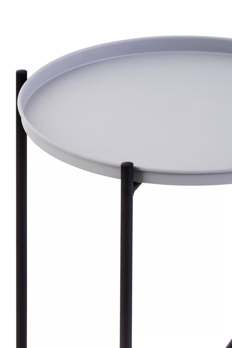 Round grey tabletop supported by slender black legs, featuring a minimalist design suitable for modern home decor