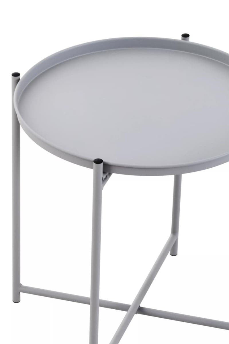 Round grey iron side table with a smooth surface and slender legs, featuring a minimalist design that complements modern decor