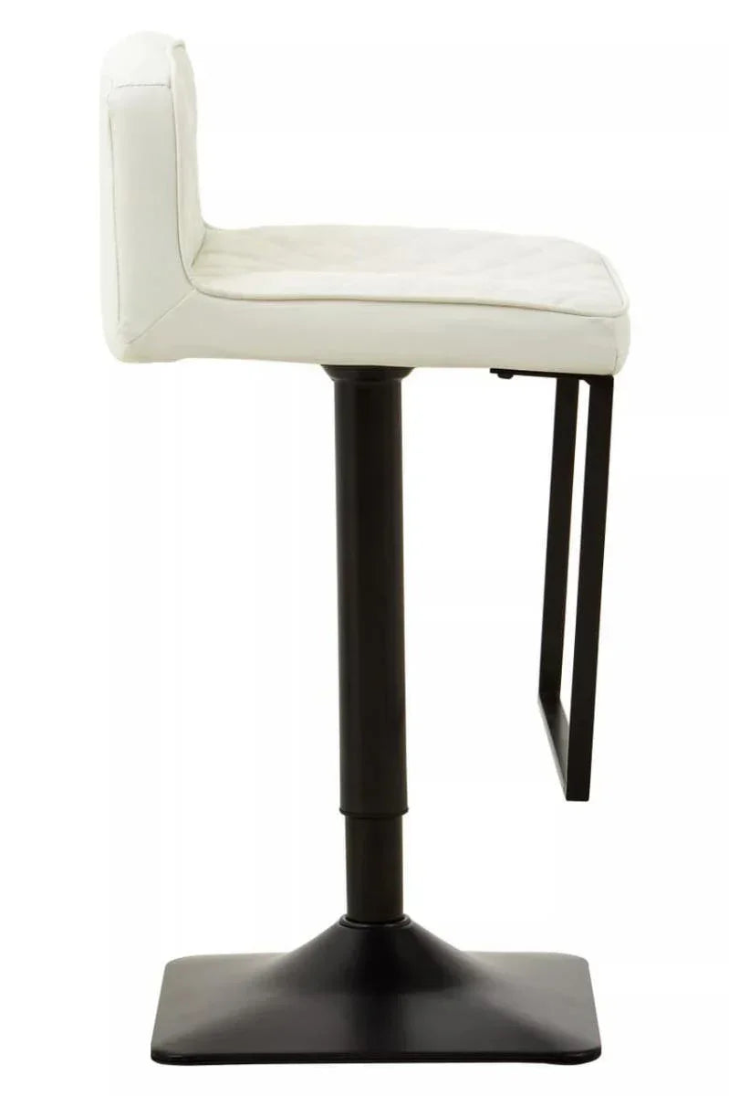 White faux leather bar stool with black pedestal base and metal footrest, side profile view