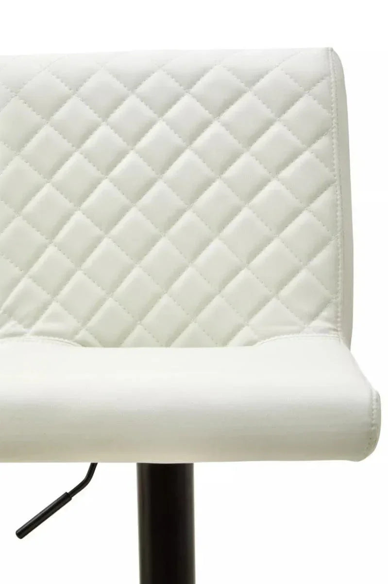 White quilted bar stool seat with black metal base and lever, close-up view