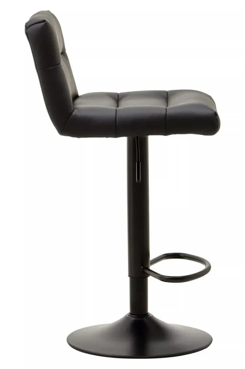 Black faux leather bar stool with cushioned seat, footrest, and round metal base side view
