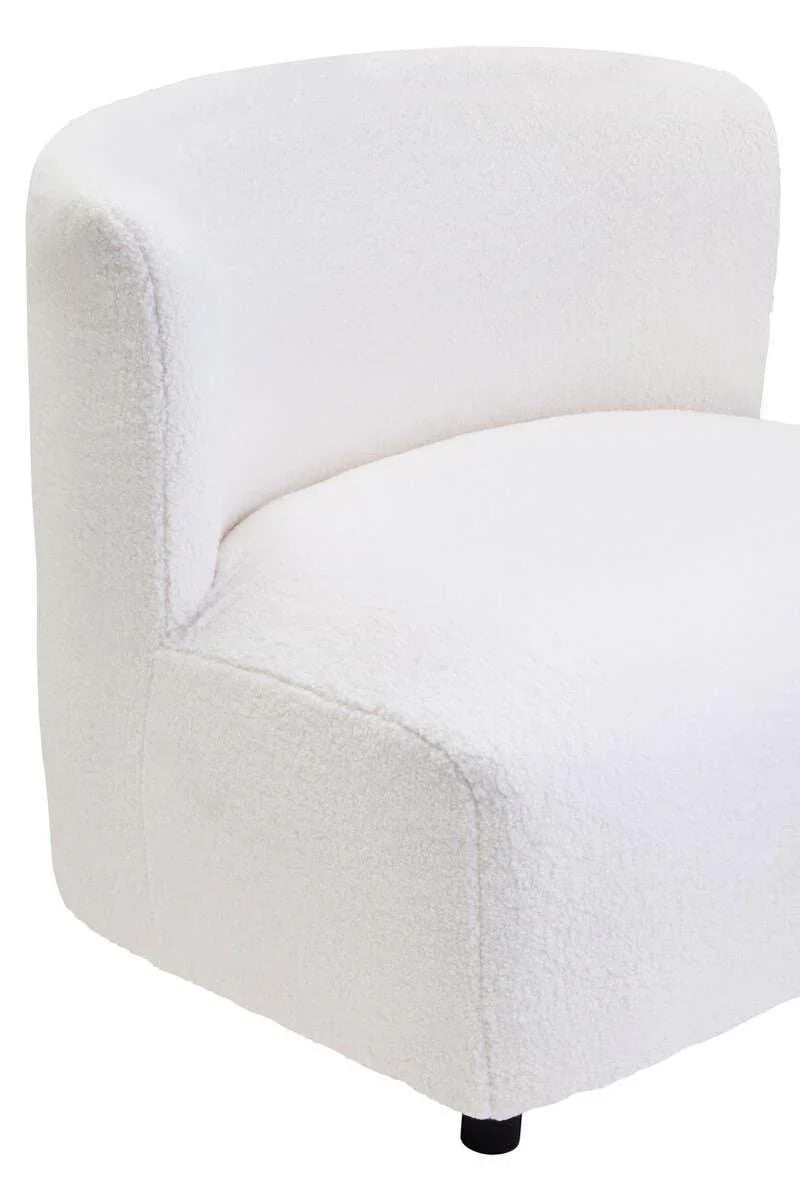 Curved white boucle accent chair with low back and black legs, upholstered seating detail