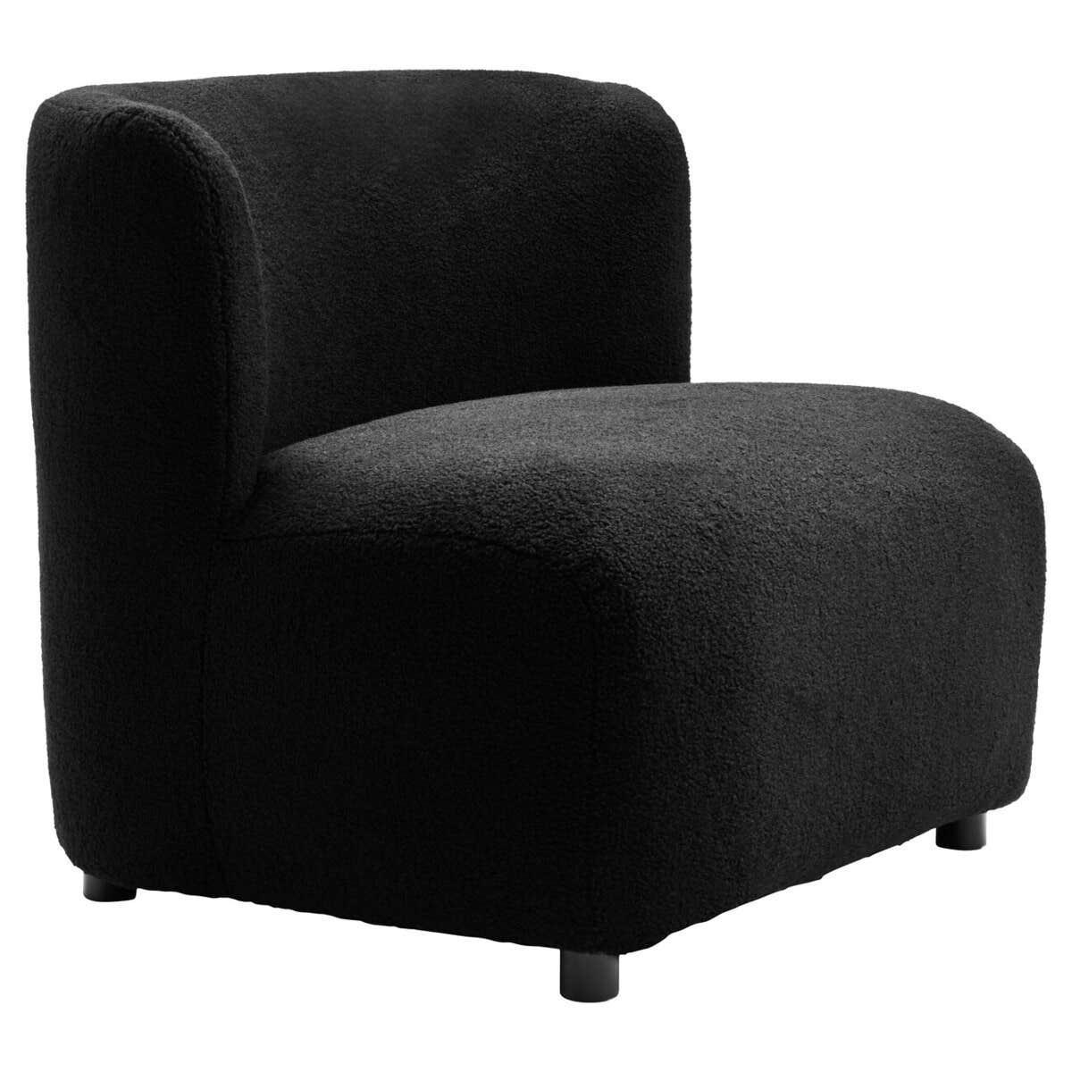 Black boucle accent chair with curved backrest and low profile, shown at angle
