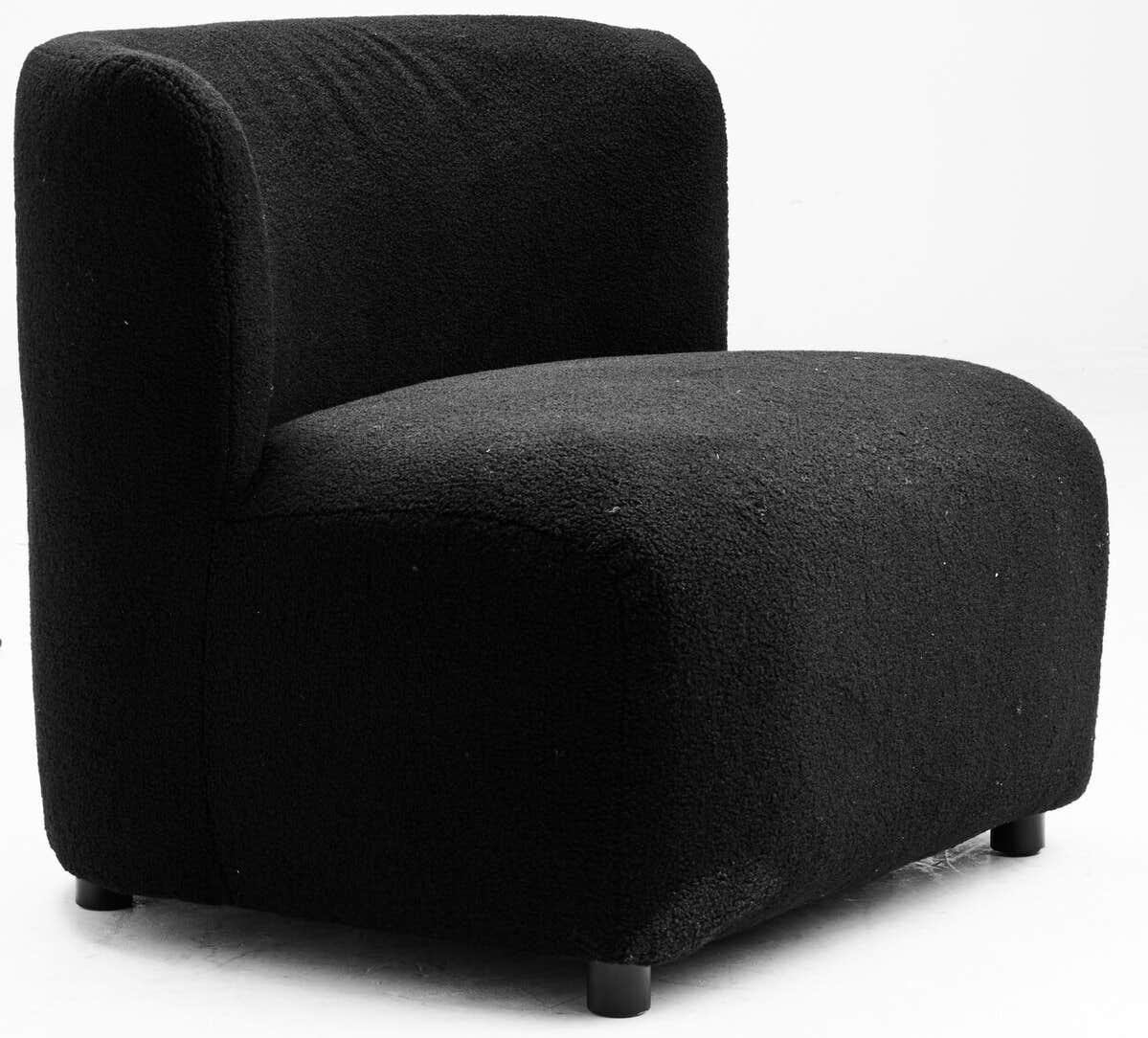 Black boucle accent chair with curved backrest and armless design on short round legs