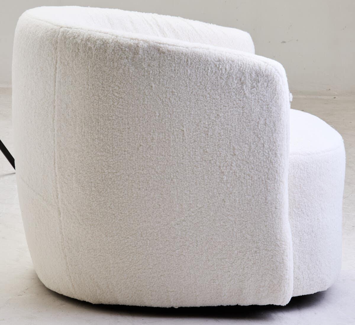 Curved white boucle accent chair with soft textured upholstery, rear side view
