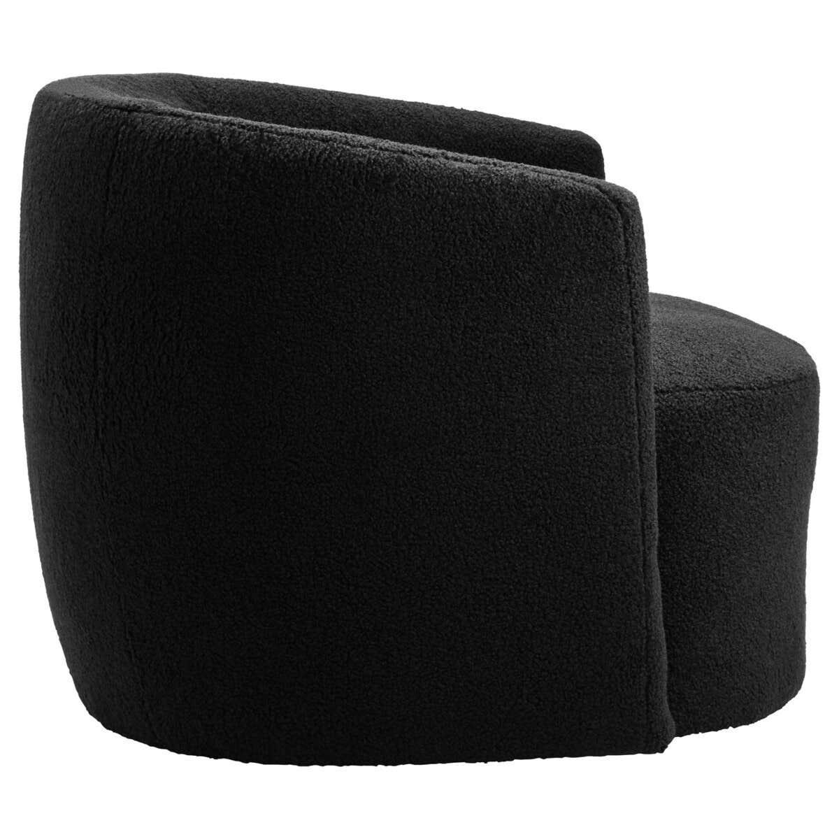 Black boucle accent chair with curved back, side angle view