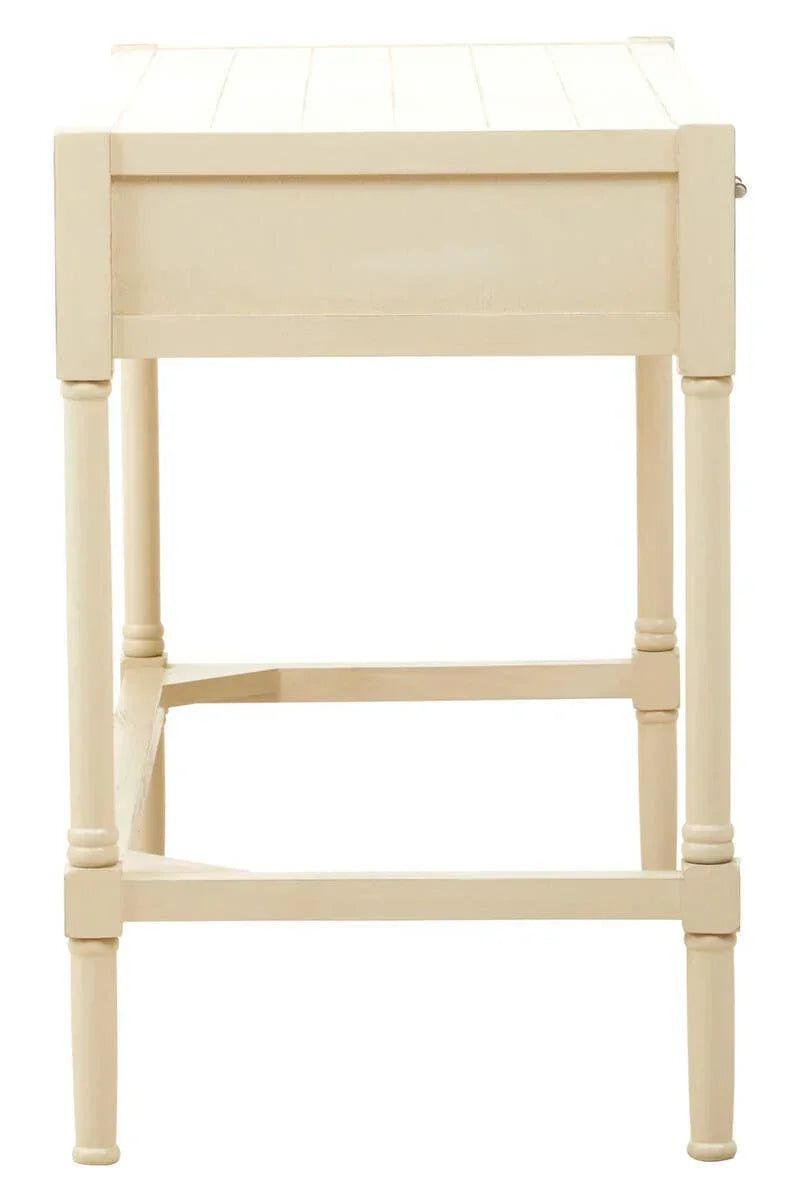 Cream wooden side table with grooved tabletop and turned legs, side profile view