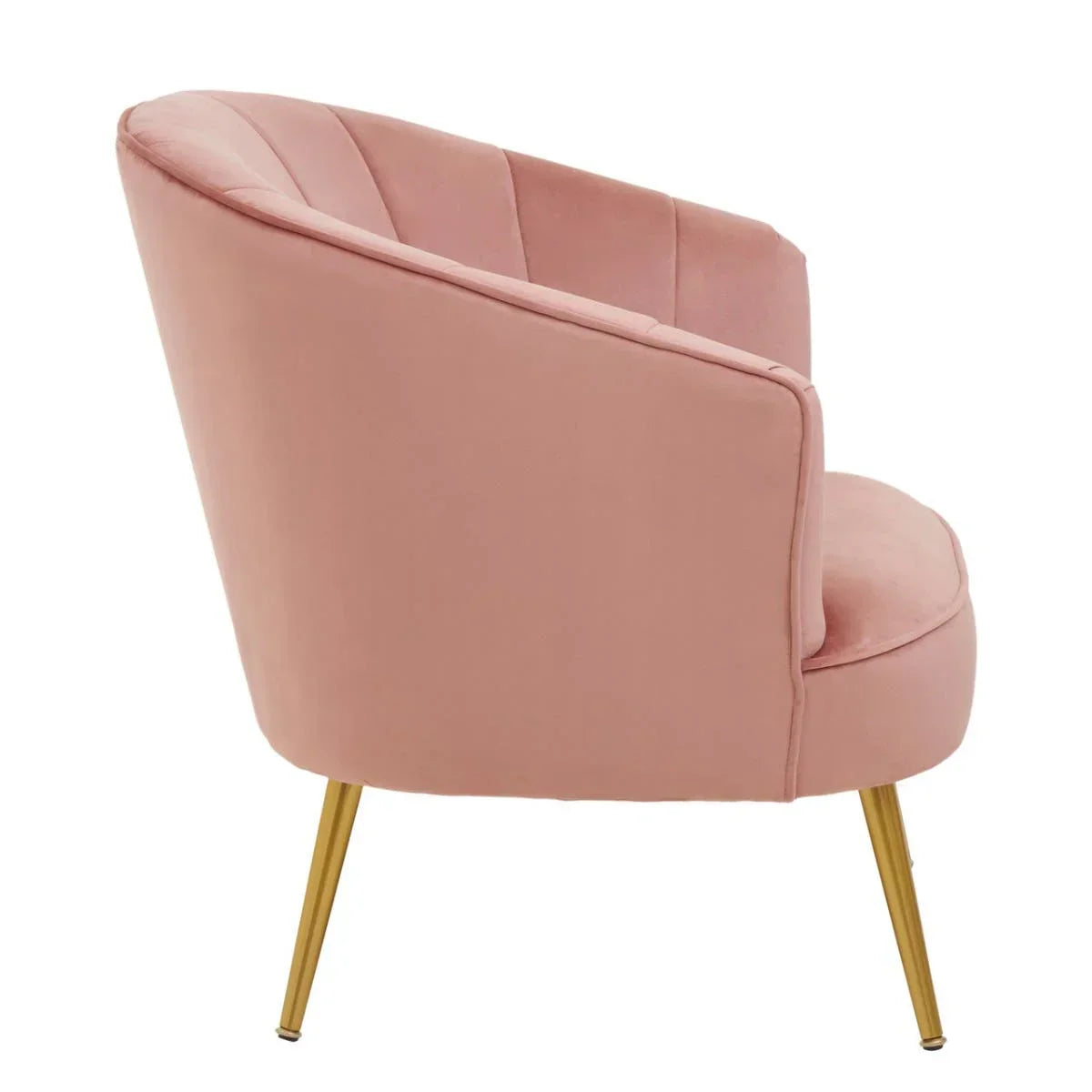 Pink velvet accent chair with gold metal legs, side view